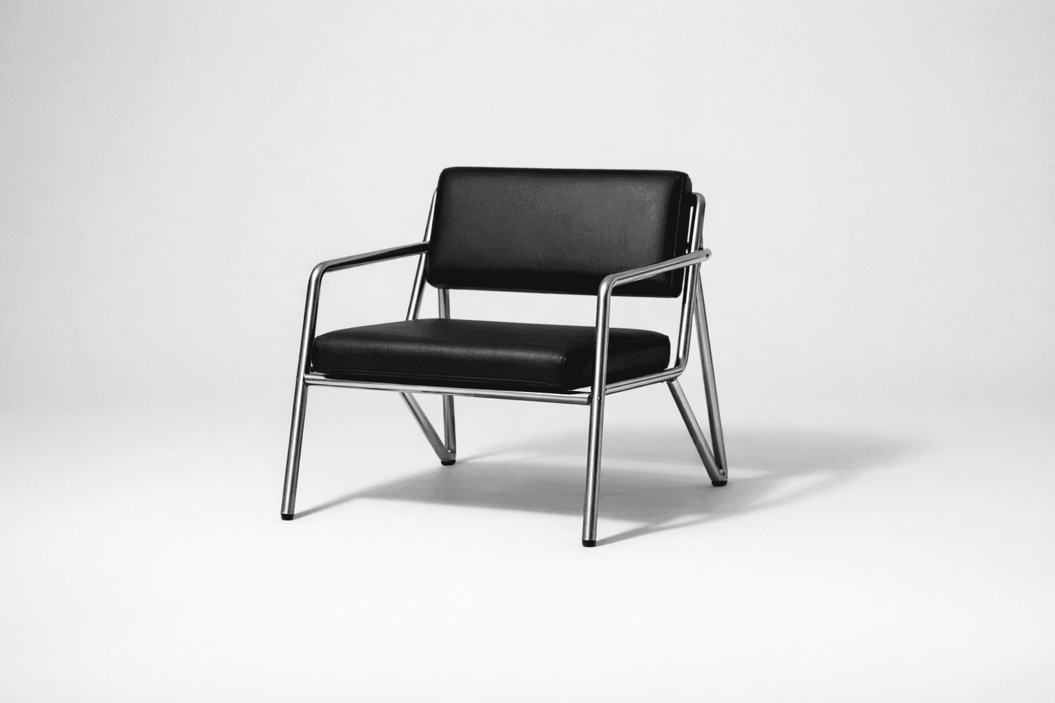 Black and white product photograph of an alpine frame chair